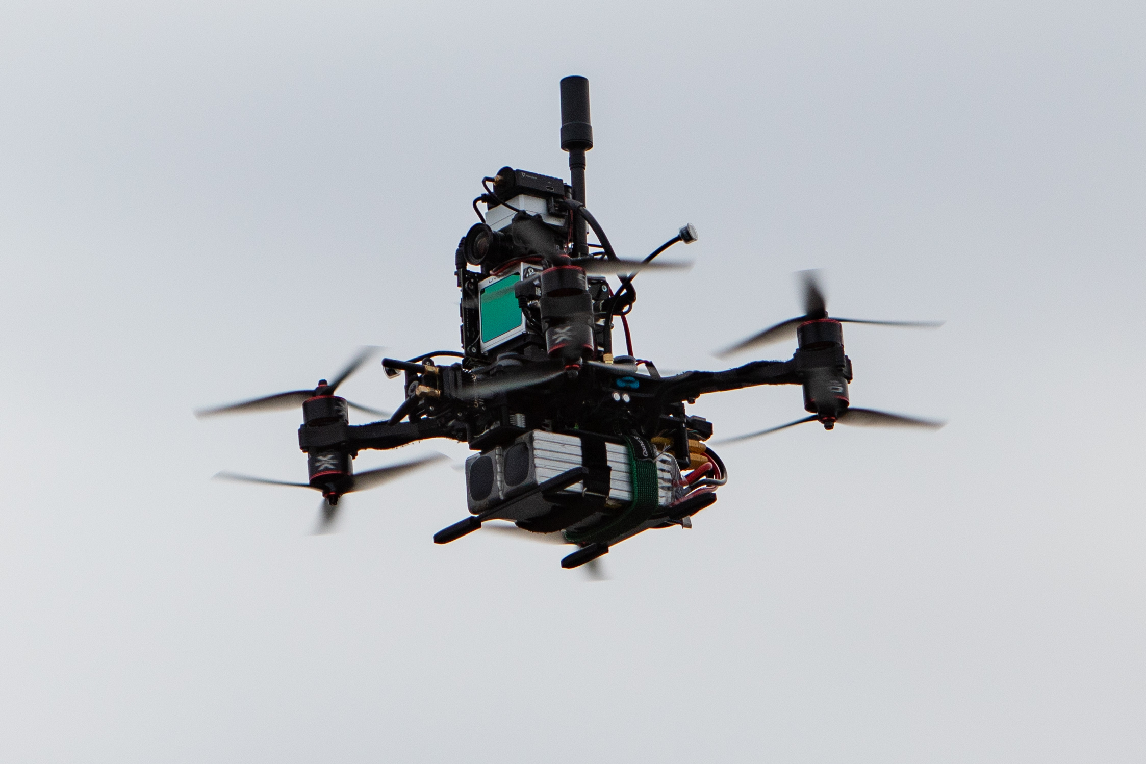 Reference photograph of a large FPV cinelifter in flight